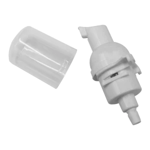 Válvula para Jabón Espuma de plástico de color blanco para dispensadores de jabón en espuma, ideal para botellas y bolsas rellenables, con una tapa protectora transparente.
