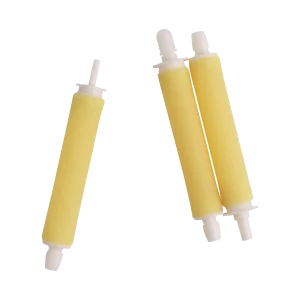 Válvula para Jabón Líquido color amarillo, fabricadas en ABS y silicona, diseñadas para dispensadores de jabón líquido o desinfectante que utilizan bolsas, mostradas en una presentación de 500 unidades.
