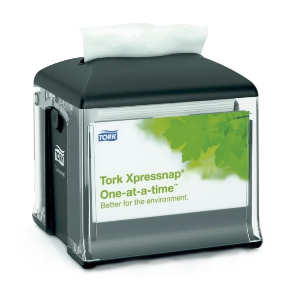 Dispensador Servilleta Xpressnap Classic. Servilletero de sobremesa Tork con capacidad para 225 servilletas, diseño compacto negro y transparente, sistema de dispensado una a una para higiene y ahorro.