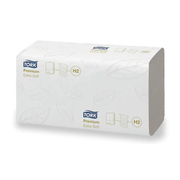 Toalla Interdoblada Premium Tork Hoja Doble. Paquete de toallas de papel blancas, con logos Tork H2, que ofrecen suavidad excepcional, absorción superior y dispensación hoja por hoja para uso eficiente y sin contacto.